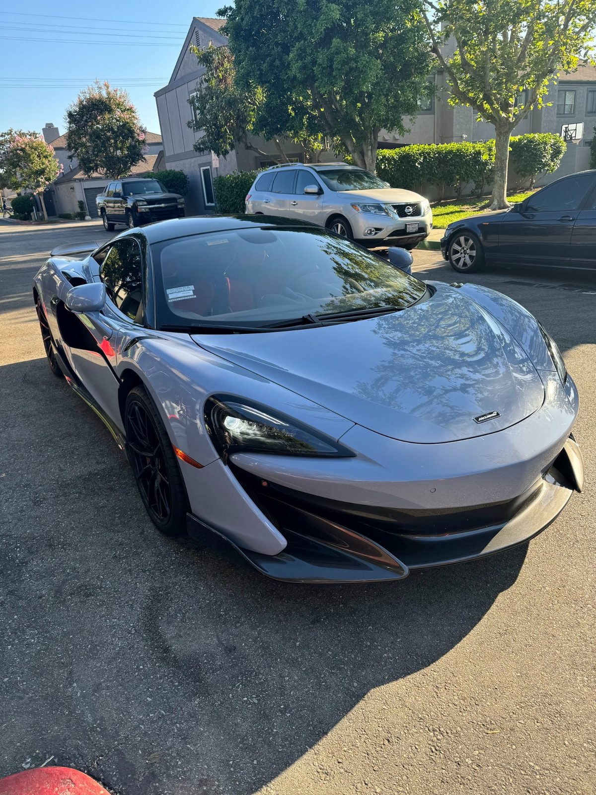 Silver McLaren after a mobile detail