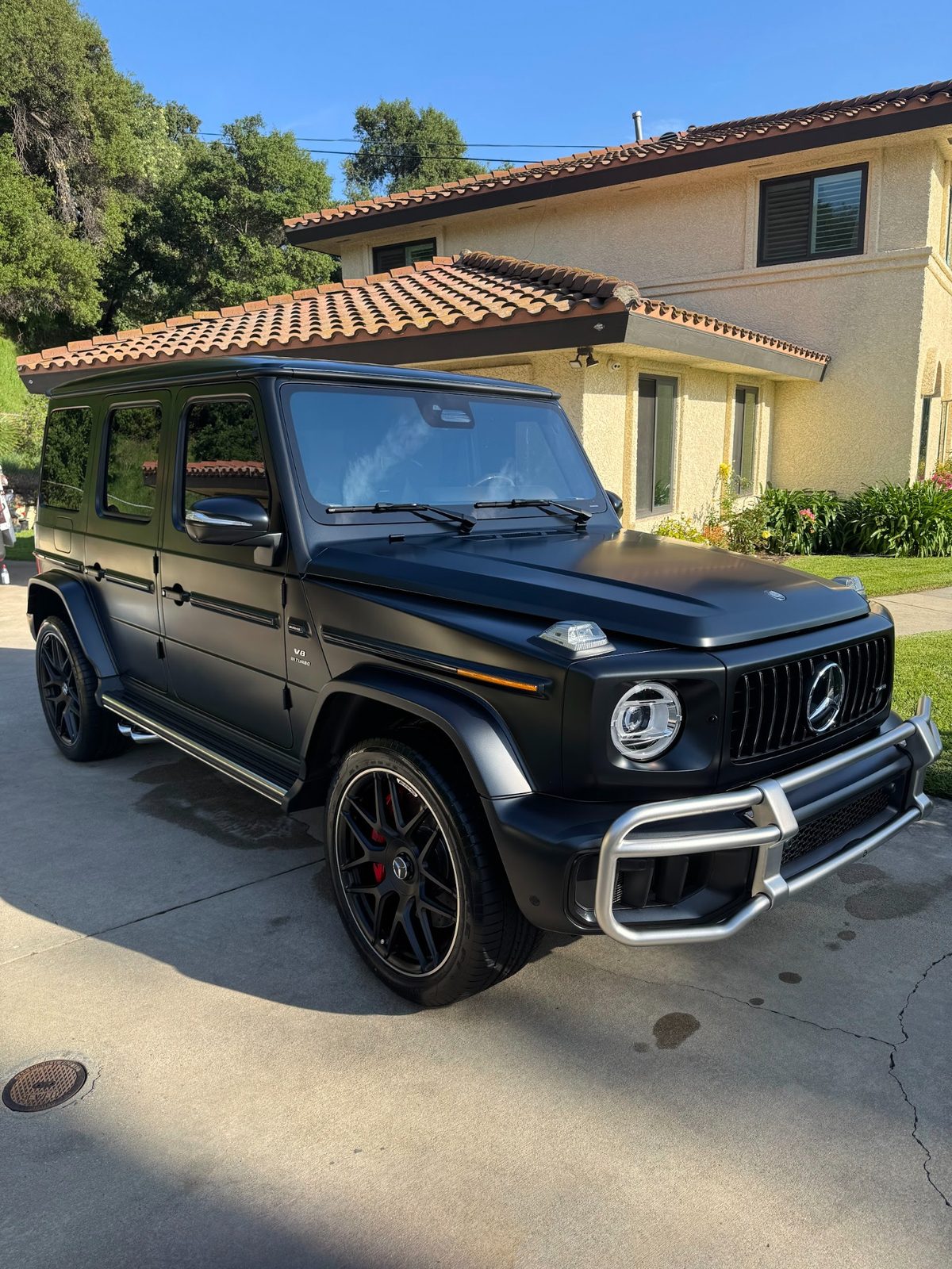 Black Mercedes-AMG G-Wagon detailed in the driveway
