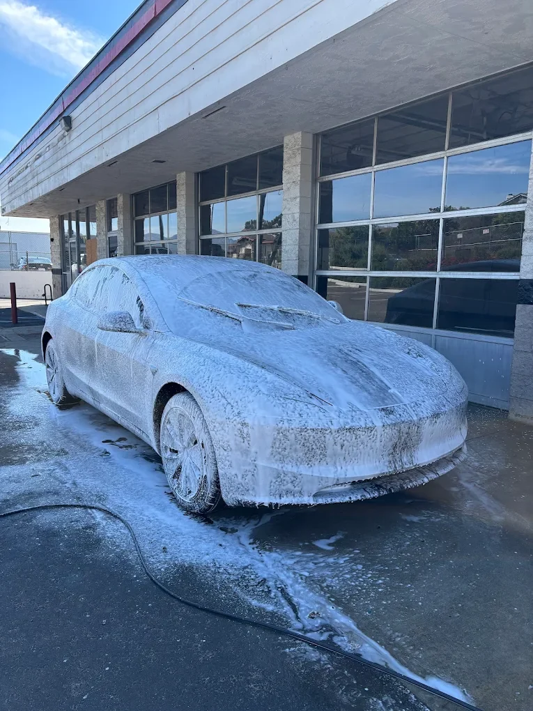 Tesla Model 3 in a full foam bath