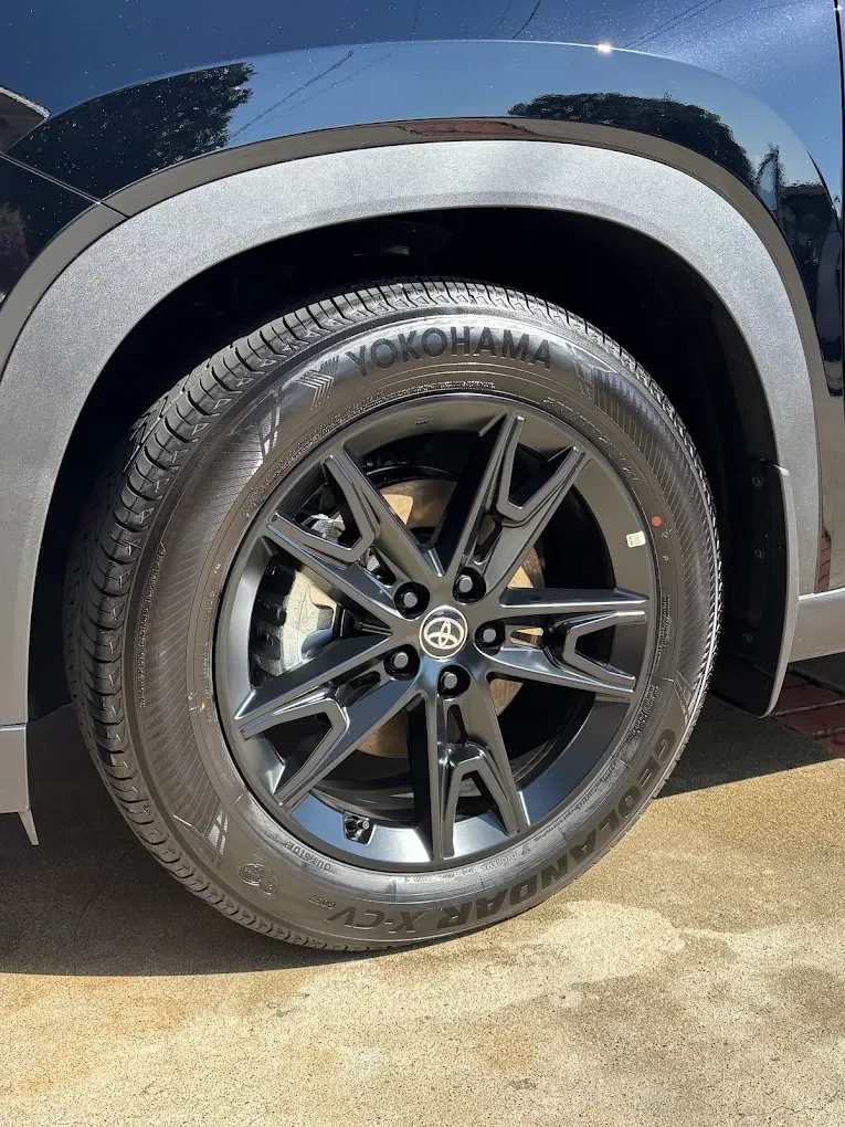 Black alloy wheels cleaned and dressed